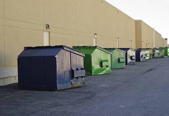 construction waste bins waiting to be picked up by a waste management company in American Fork